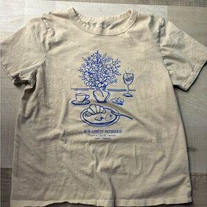 Woman’s Cream Graphic Tee